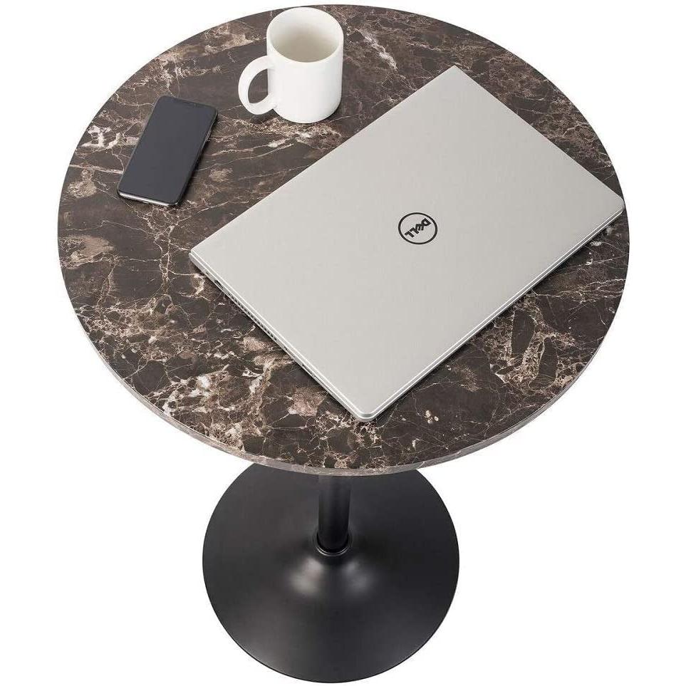 Round Pub Table With Faux Marble Top And Black Metal Base with laptop, phone, and coffee cup on top.