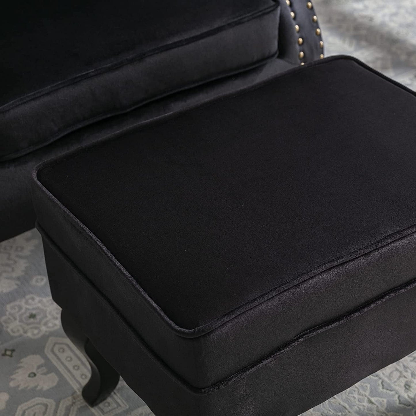 Elegant Black Velvet Wingback Chair With Ottoman Set - close-up of black ottoman cushion.