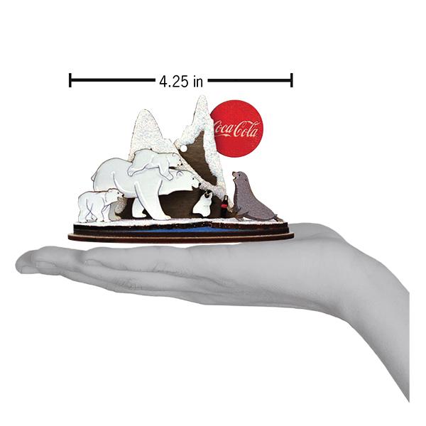 Small model of animals with a Coca-Cola logo on a white background