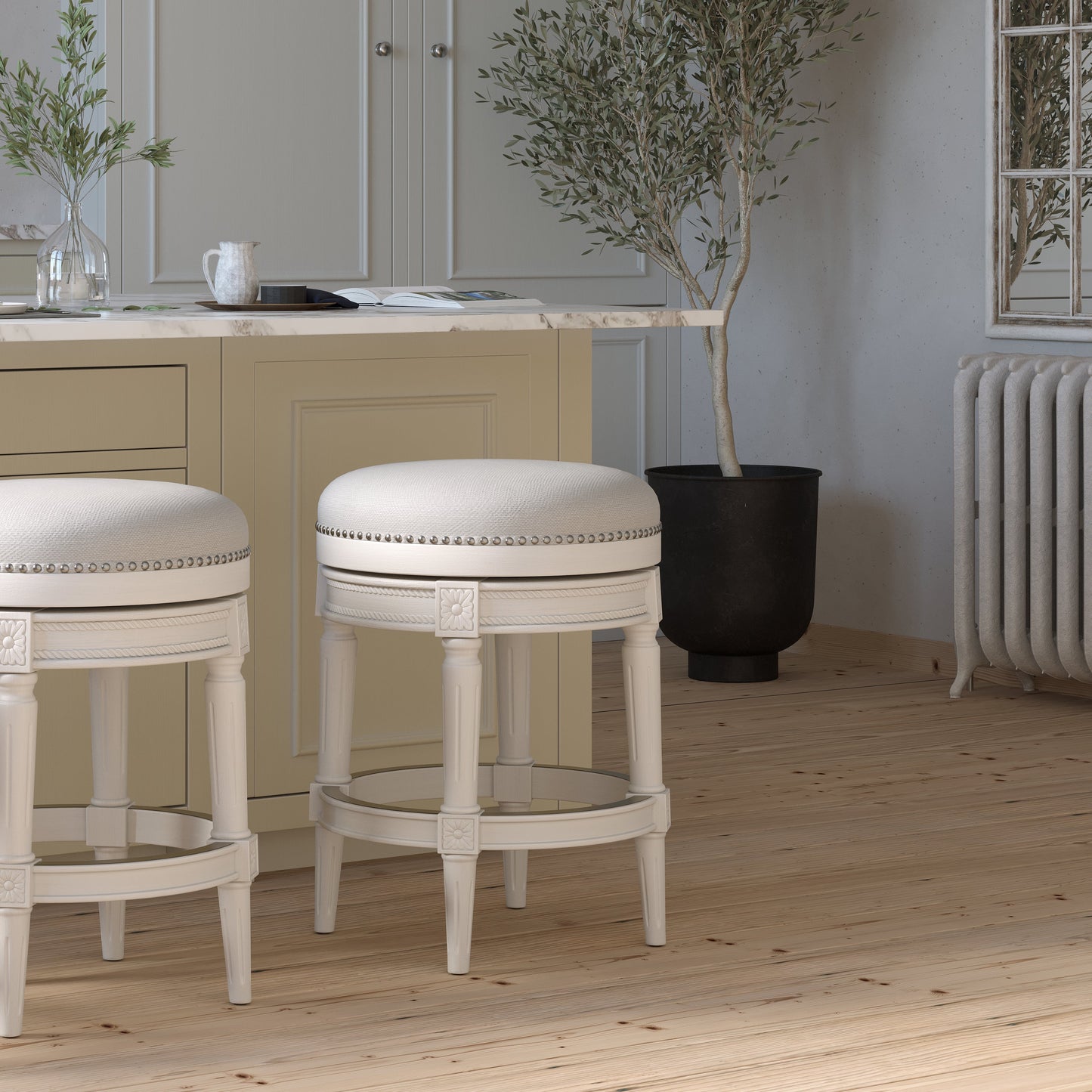 Backless Charlotte Barstool in White featured in a stylish kitchen setting with a light wood floor.
