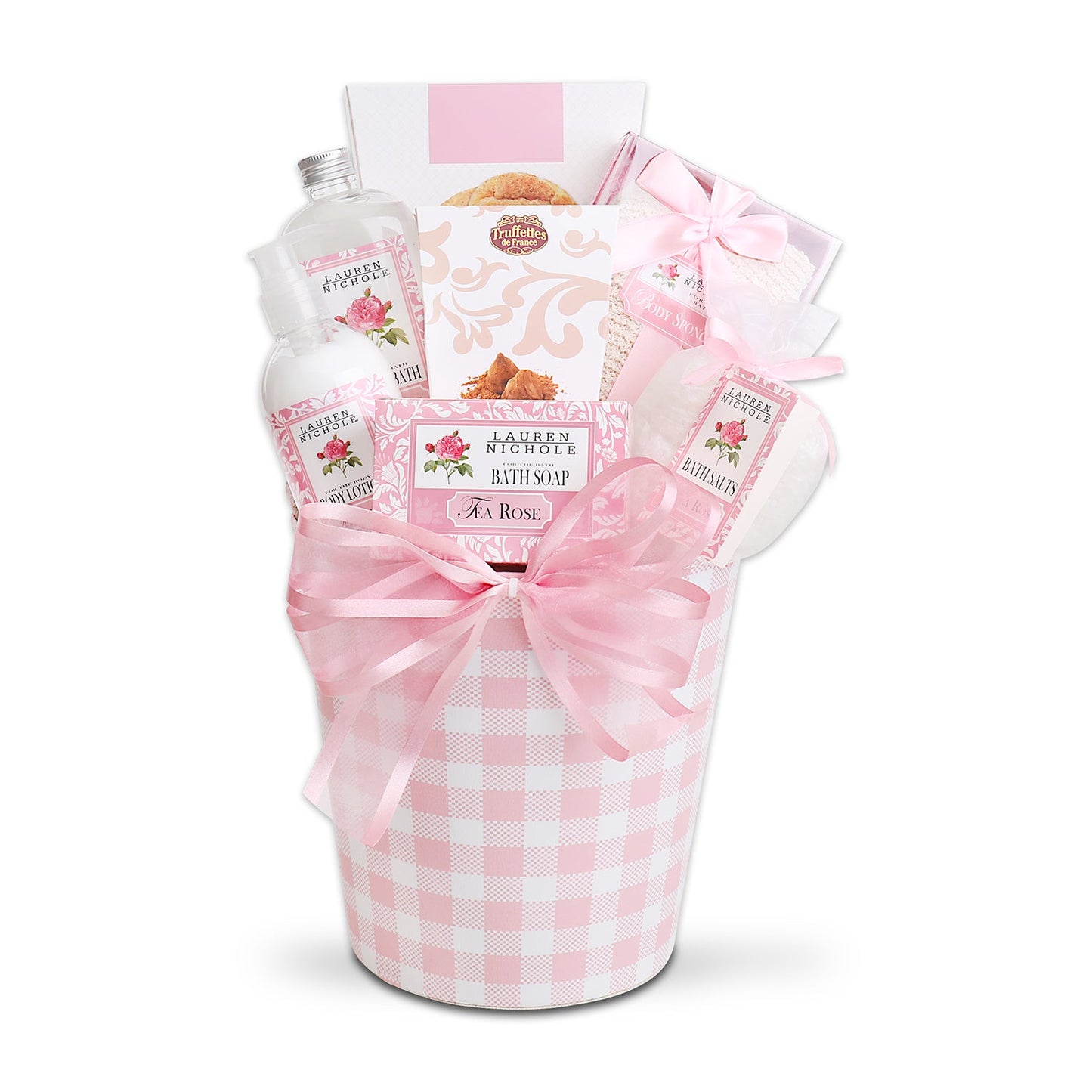 Pink gift basket with various items including soap, bath salts, and lotion on a white background