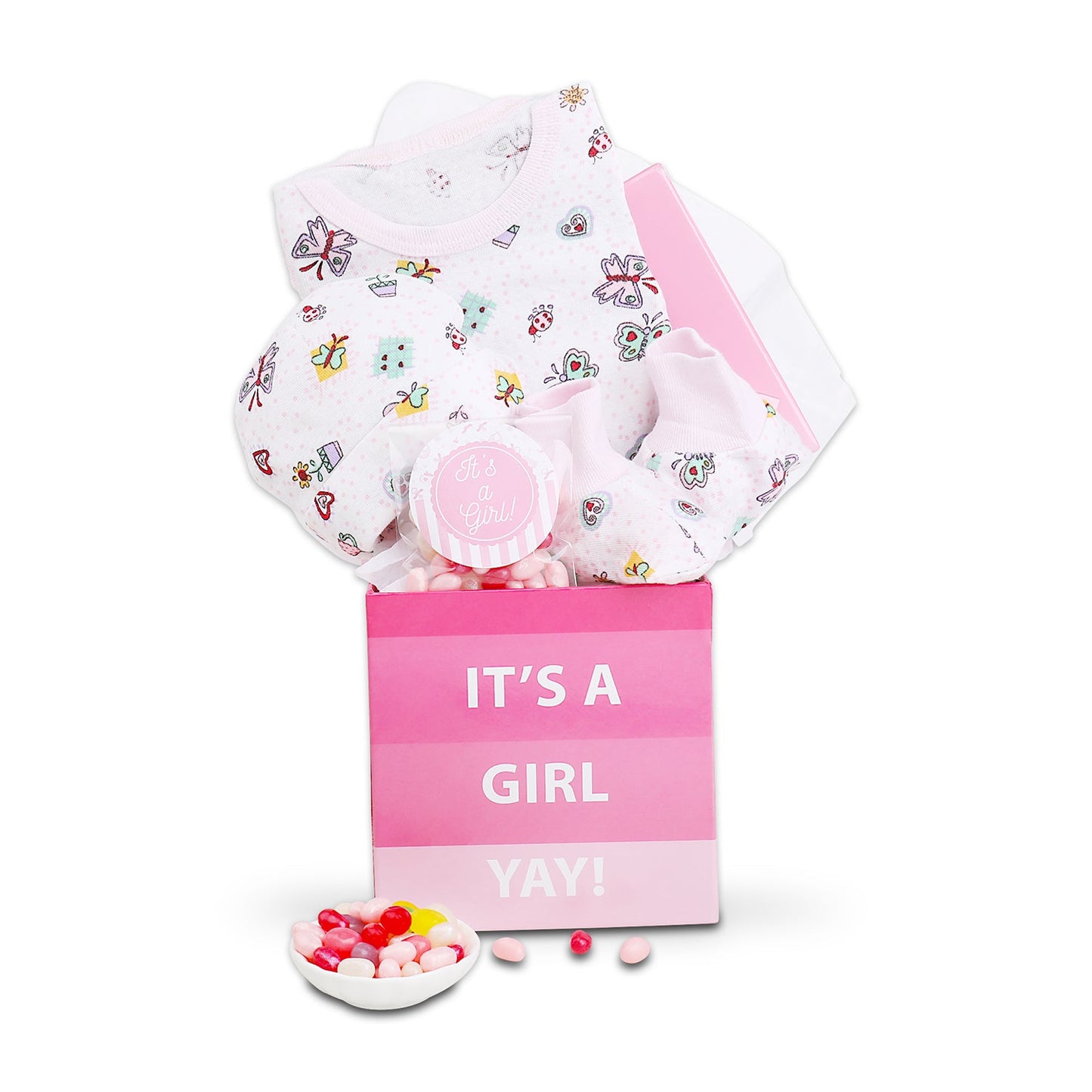 Baby girl gift set with pink box, baby socks, and a small bowl of candies on a white background