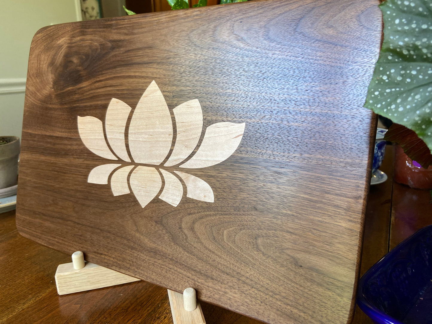 Stunning Walnut charcuterie board with Lotus Flower inlay made from soft Maple.