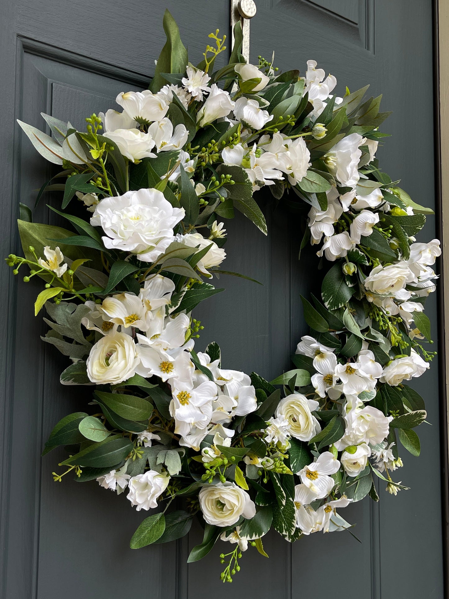 White & Green Dogwood, Ranunculus, and Eucalyptus Wreath