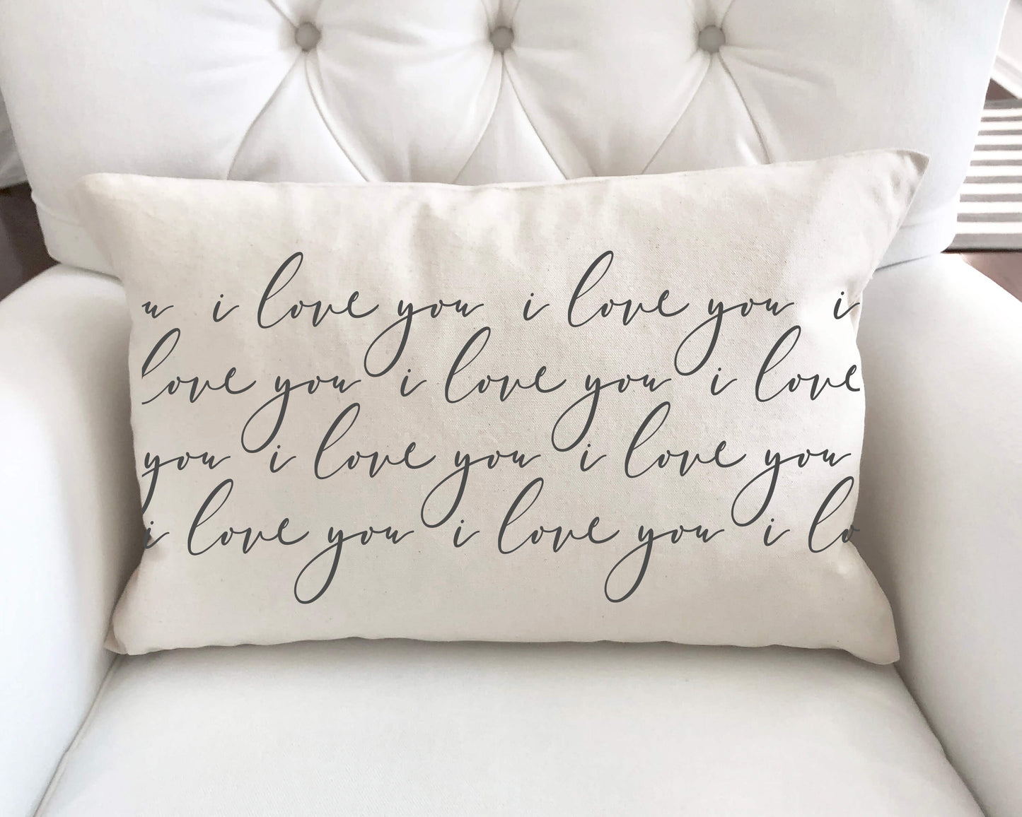 I Love You Pattern Charcoal Valentine's Day Pillow Cover on a white armchair with elegant script design.