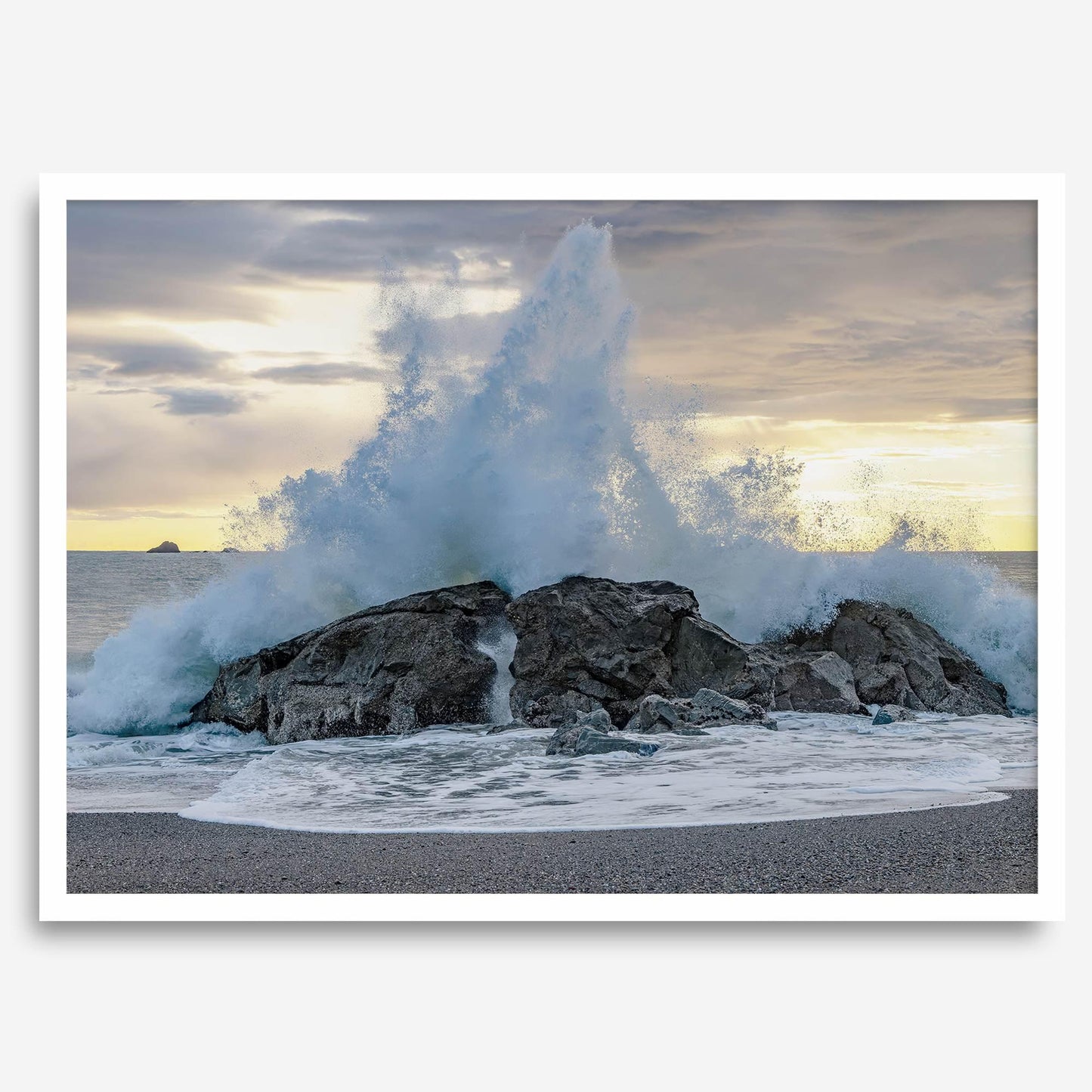 Liquid Fire: Dramatic ocean wave crashing on a rock at a Pacific Northwest beach in California.