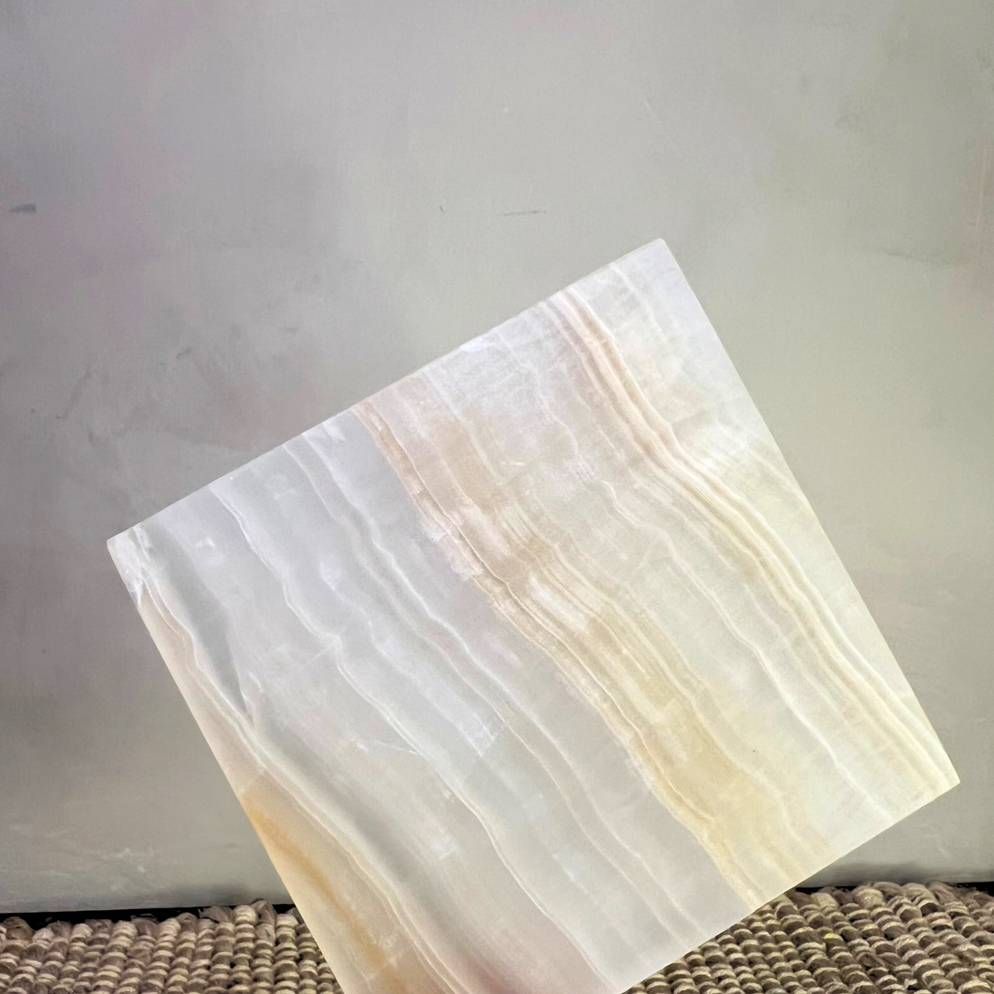 Onyx Coasters - Caramels showcasing a unique honed finish and elegant pattern variations, perfect for protecting surfaces.
