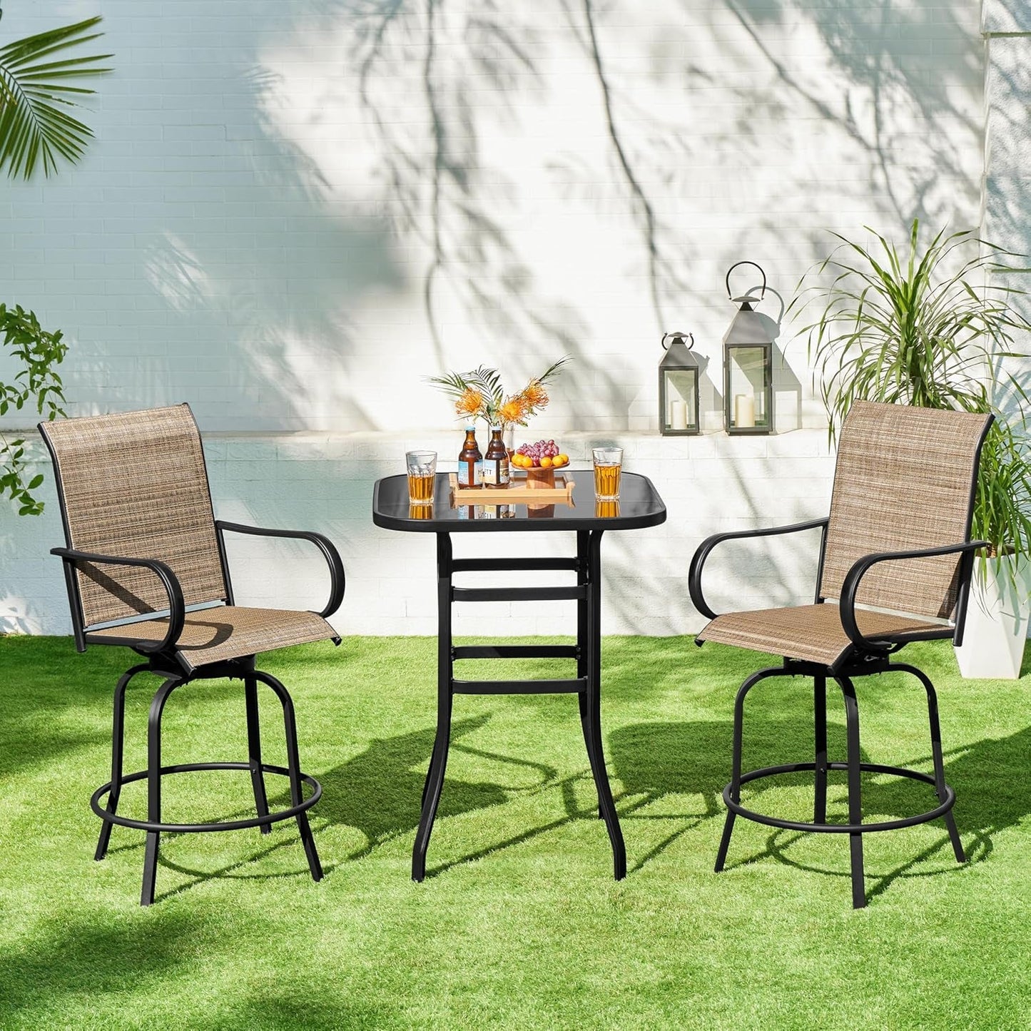 Outdoor Swivel Barstools Set of Four around a modern table in a sunny garden setting with drinks.