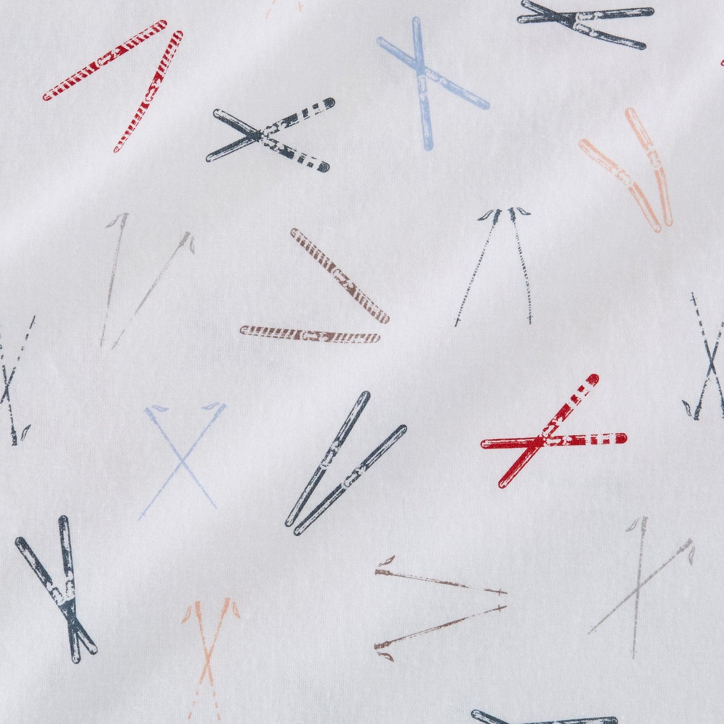 Pattern of crossed skis on a white background