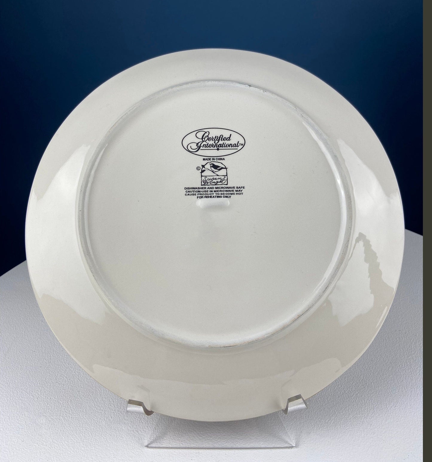 White plate with 'Certified International' logo on a blue background