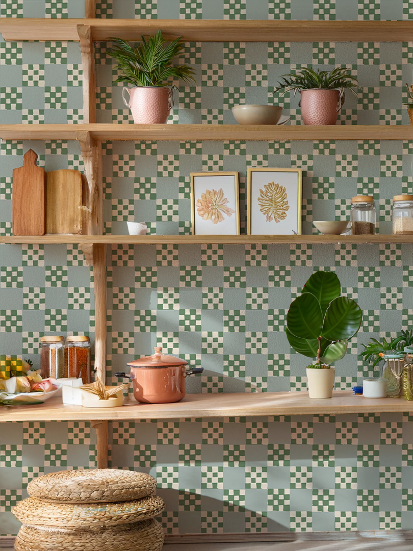 Checkered Quilt Wallpaper in mint, sage, and white, featuring a stylish kitchen shelf and decorative plants.