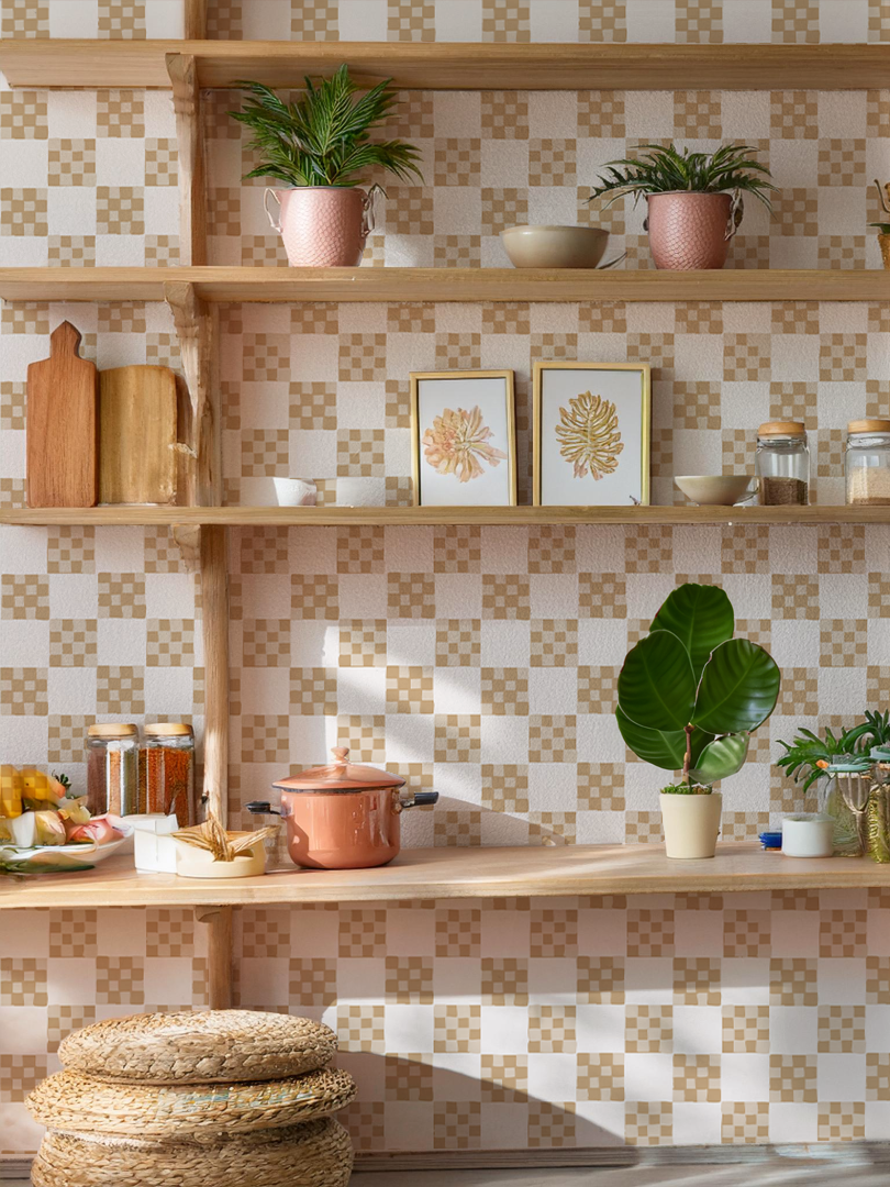 Checkered Quilt Wallpaper in tan and white with kitchen decor and plants on shelves.