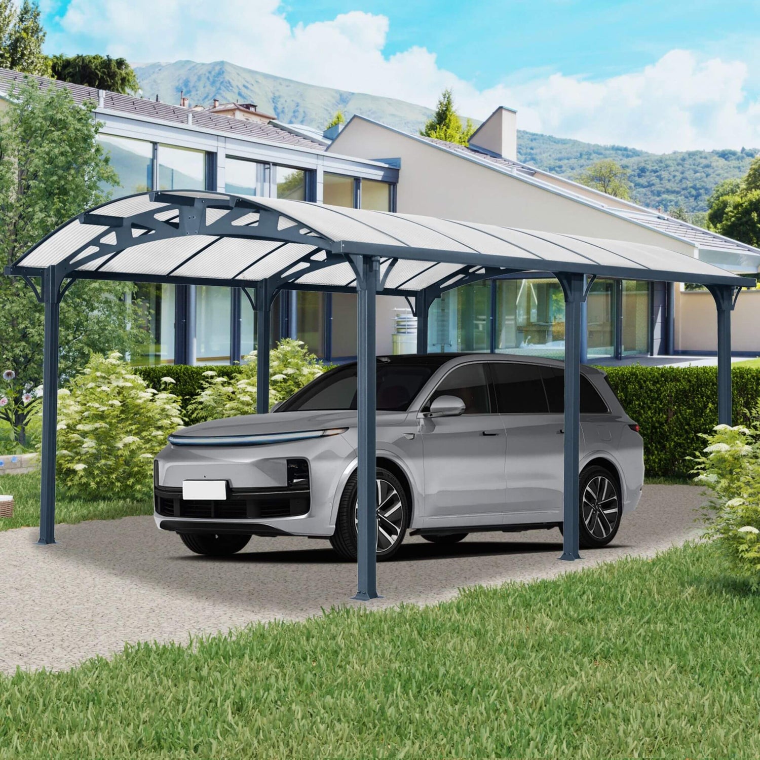 Carports providing shelter for a silver car in a modern residential setting with greenery.
