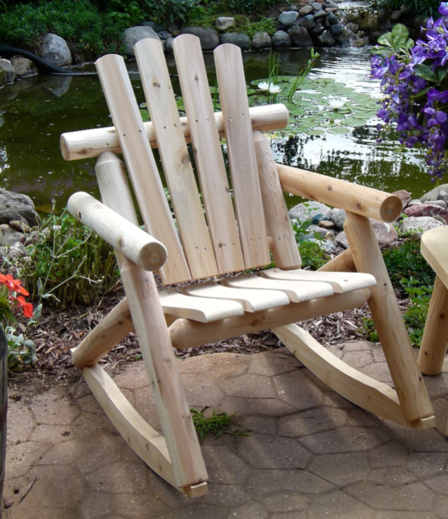 Outdoor Rocking Chairs in a serene garden setting near a pond.