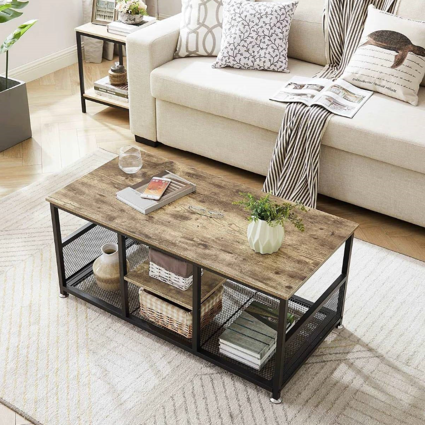 Industrial Living Room with a rustic wooden coffee table and cozy couch in a stylish setting.