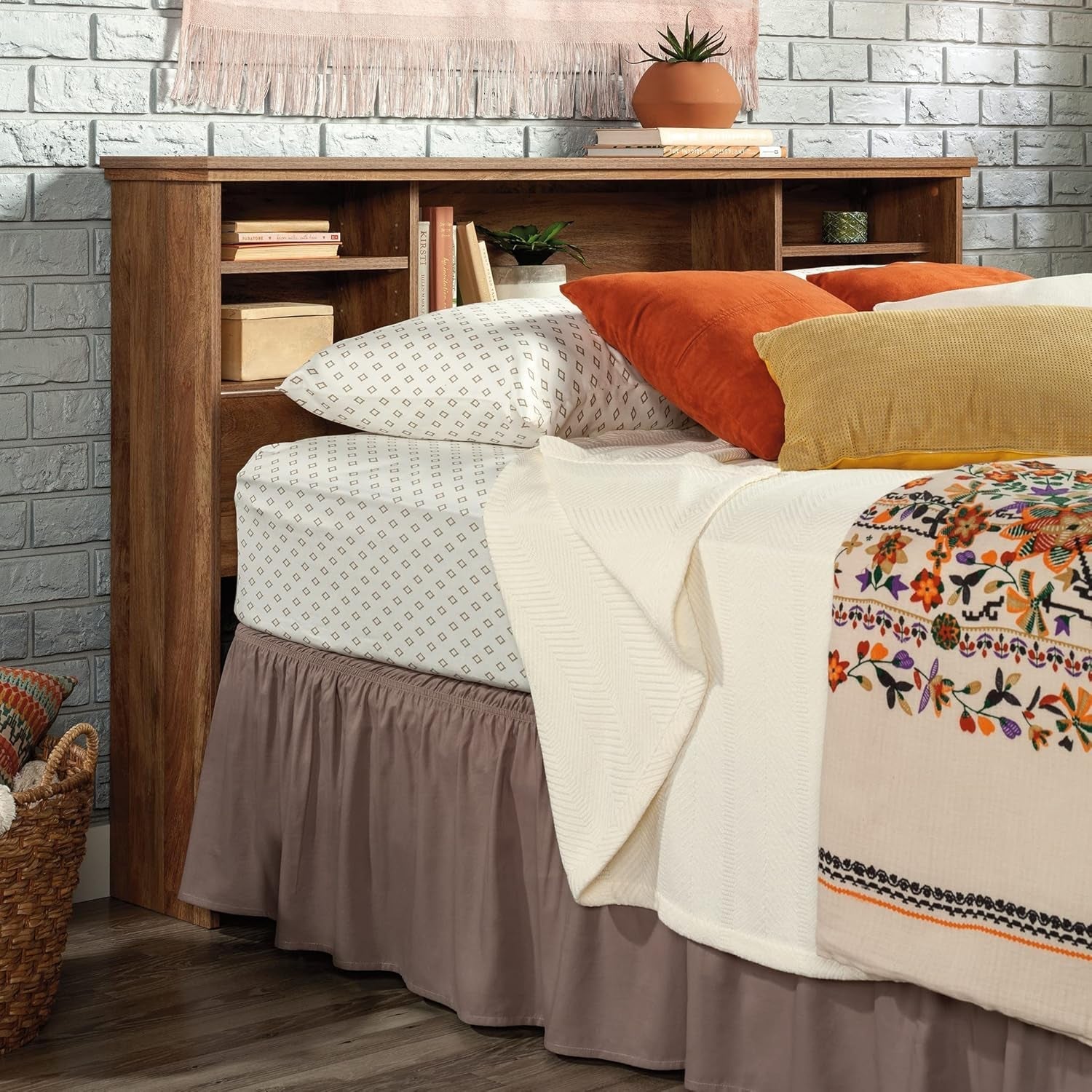 Cozy bedroom scene featuring a Bookcase Headboards design with colorful pillows and a stylish bed.