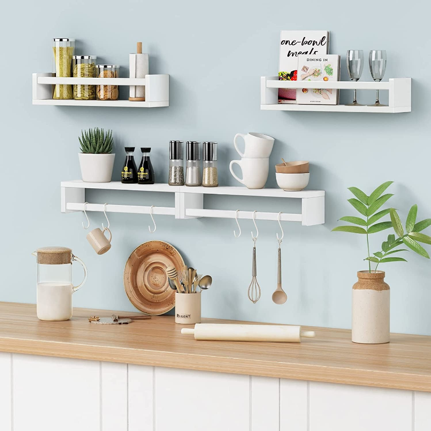 Floating Bookshelves with kitchen items and decor arranged on a modern wall.