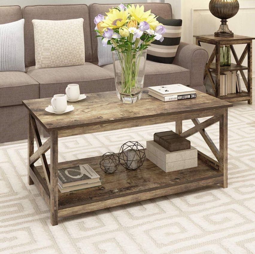 Farmhouse Living Room with a wooden coffee table, decorative flowers, and a cozy couch.