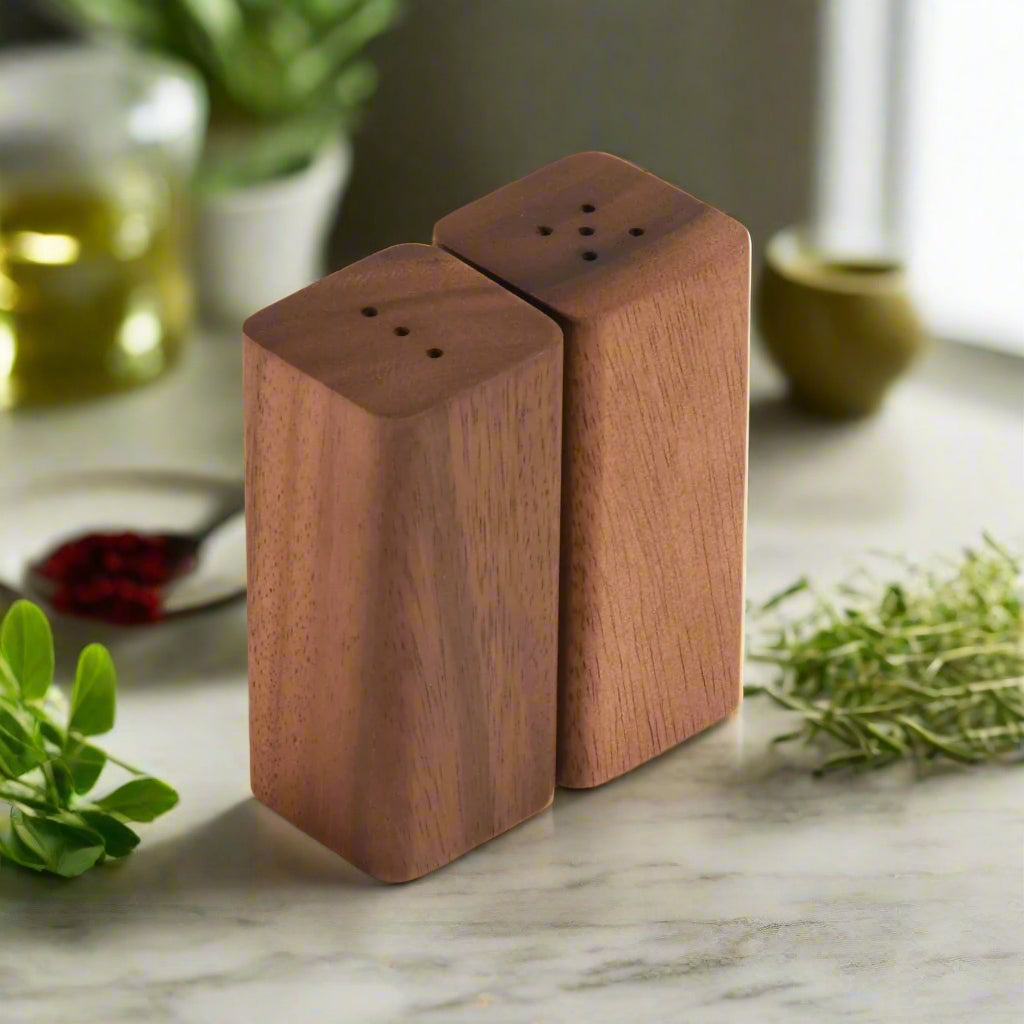 Salt and Pepper Shakers made of wood, elegantly designed for stylish dining decor.