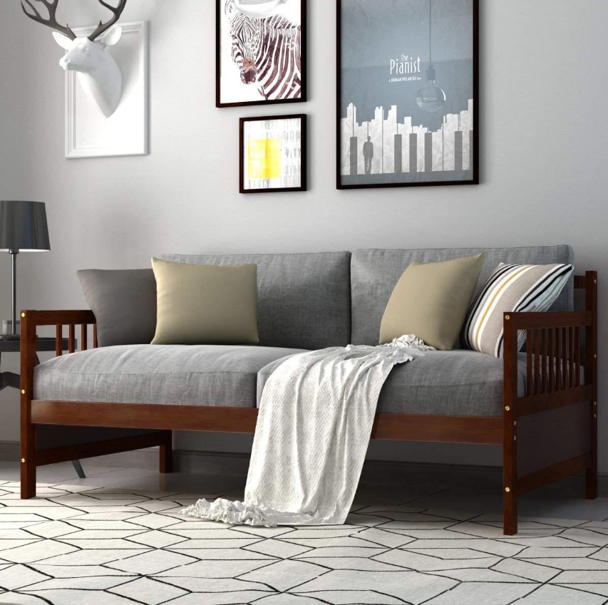 Stylish Mission Living Room with a gray sofa, decorative pillows, and framed artwork on the wall.