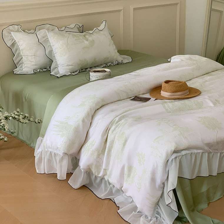 Stylish Twin and Twin XL Duvets displayed on a bed with elegant bedding and decorative accessories.