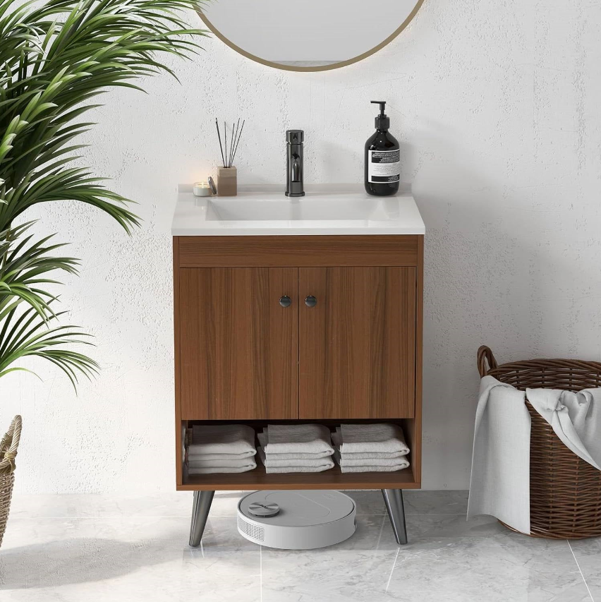 Mid-Century Modern Bathroom with wooden vanity, sink, and towels on display.