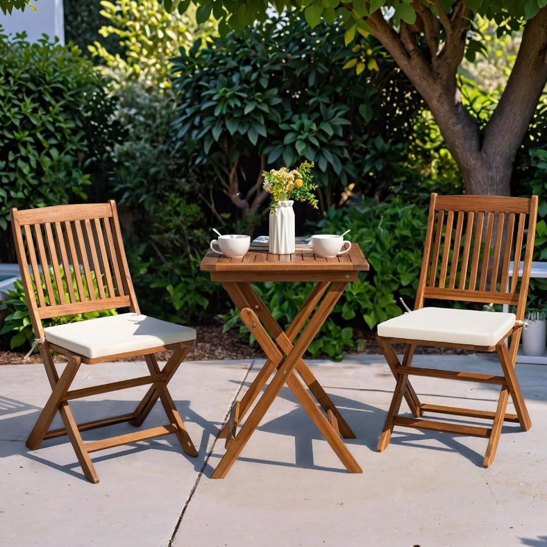 Cosy outdoor space featuring a set of Patio Bistro Sets with wooden chairs and a small table.
