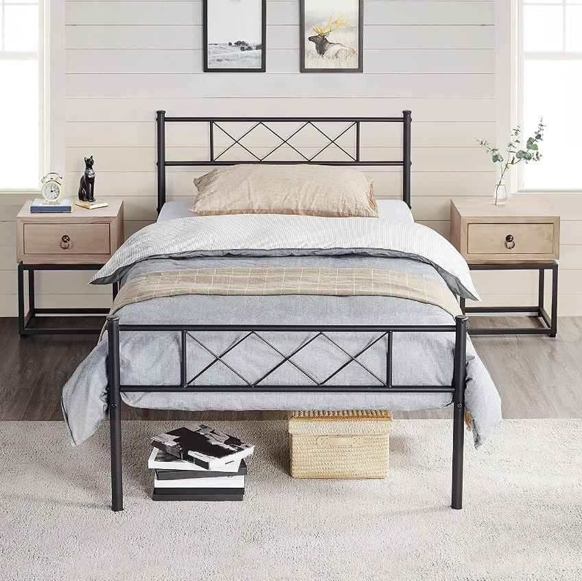 Twin and Twin XL Beds - Modern metal bed frame with soft bedding and stylish bedside tables in a bright room.