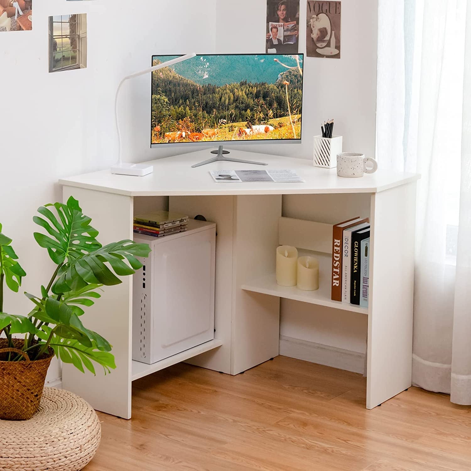 Stylish corner desks with a modern design, featuring a large monitor and greenery in a well-lit workspace.