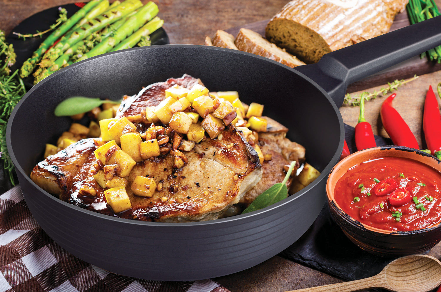 Skillets and Frying Pans with sautéed meat and vegetables, showcasing deliciously cooked food in a pan.