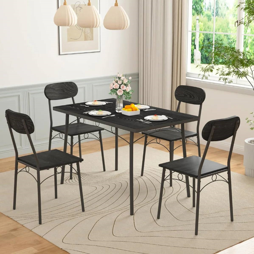 Modern Dining Room featuring a sleek black table and chairs, perfect for contemporary dining spaces.