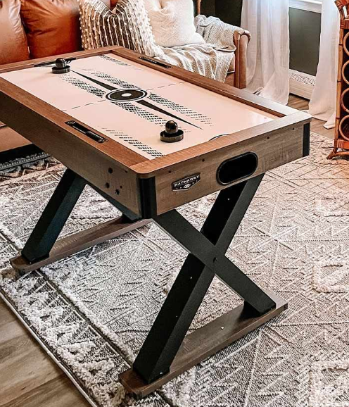 Multi-Game Tables featuring an air hockey set-up in a spacious living room.