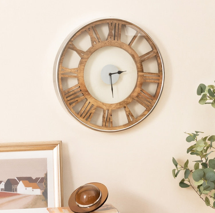 Classic Living Room with vintage wooden wall clock and decorative items on the table.