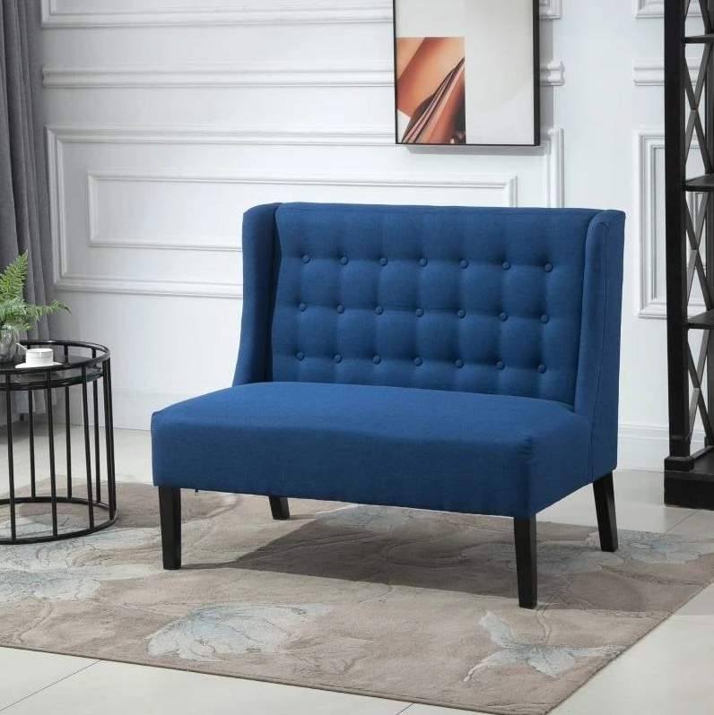 Scandinavian Foyer featuring a stylish blue tufted loveseat in an elegant interior setting.