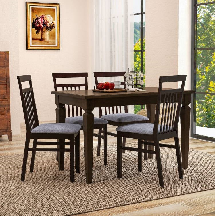 Classic Dining Room featuring a wooden table and chairs with a bright view through large windows.