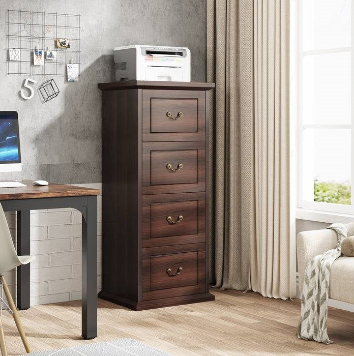 Traditional Home Office featuring a dark wood filing cabinet beside a desk and printer.