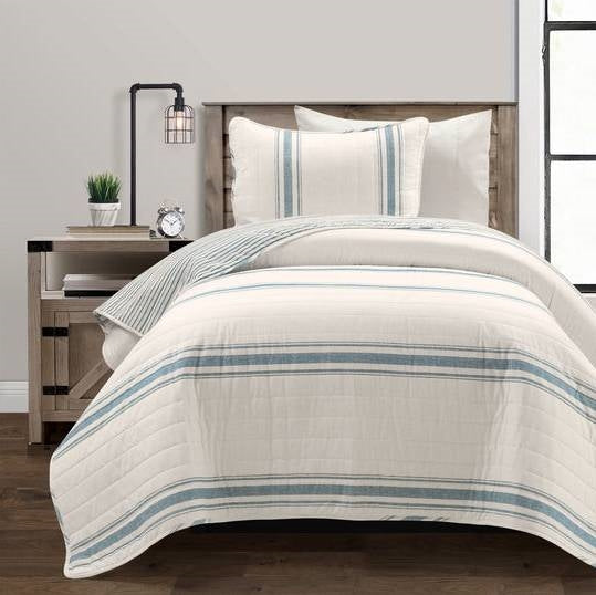 Twin and Twin XL Bed Linens featuring a striped design on a quilted coverlet and matching pillows.