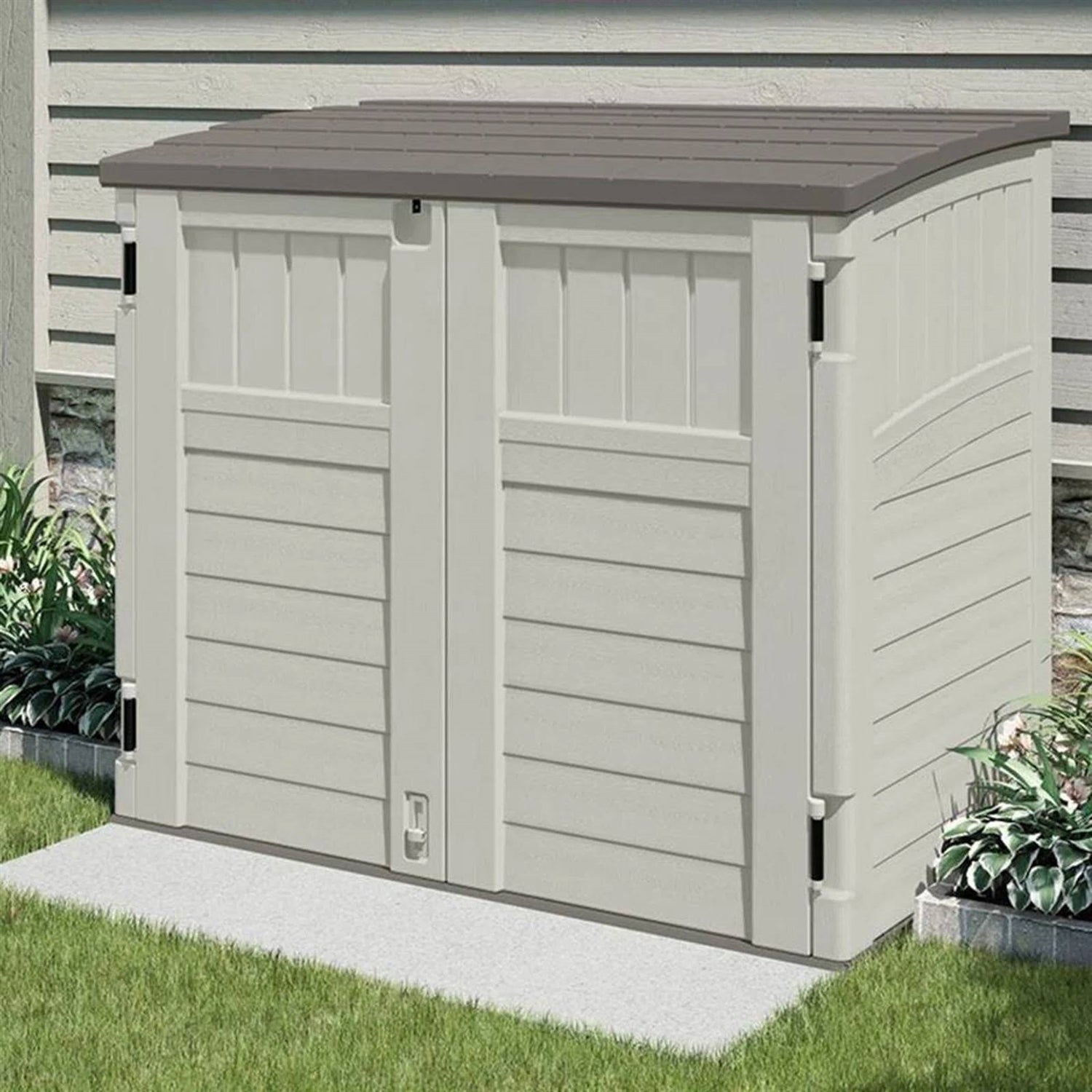Outdoor storage unit with a brown roof, perfect for organizing tools in your garden shed.