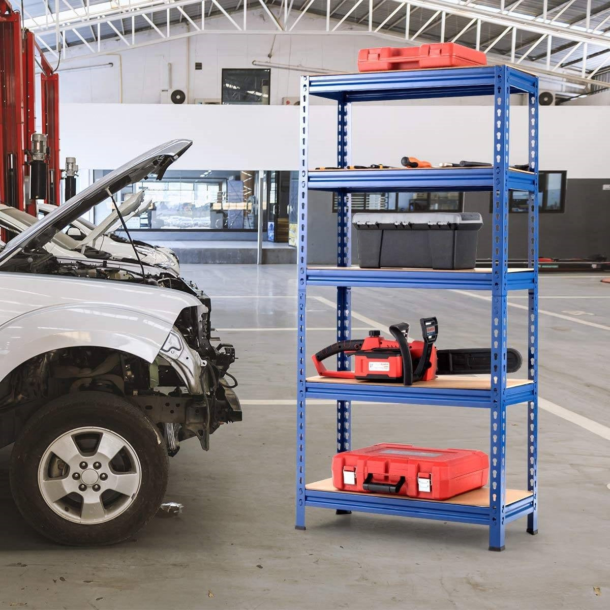 Workshop shelving unit in an auto workshop, showcasing tools and storage solutions.