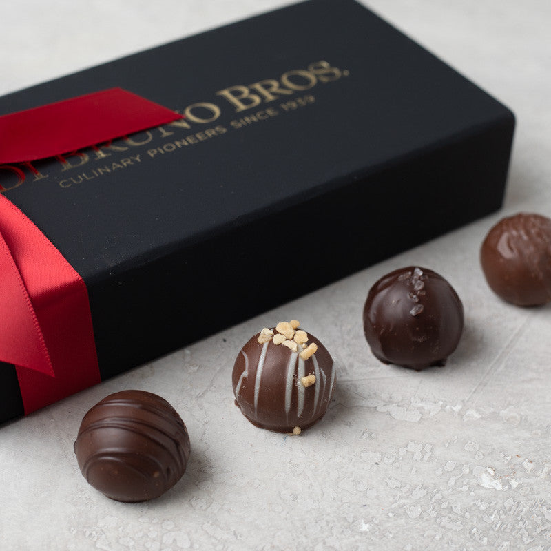 Gourmet and Specialty Foods collection featuring assorted chocolate truffles in an elegant box.