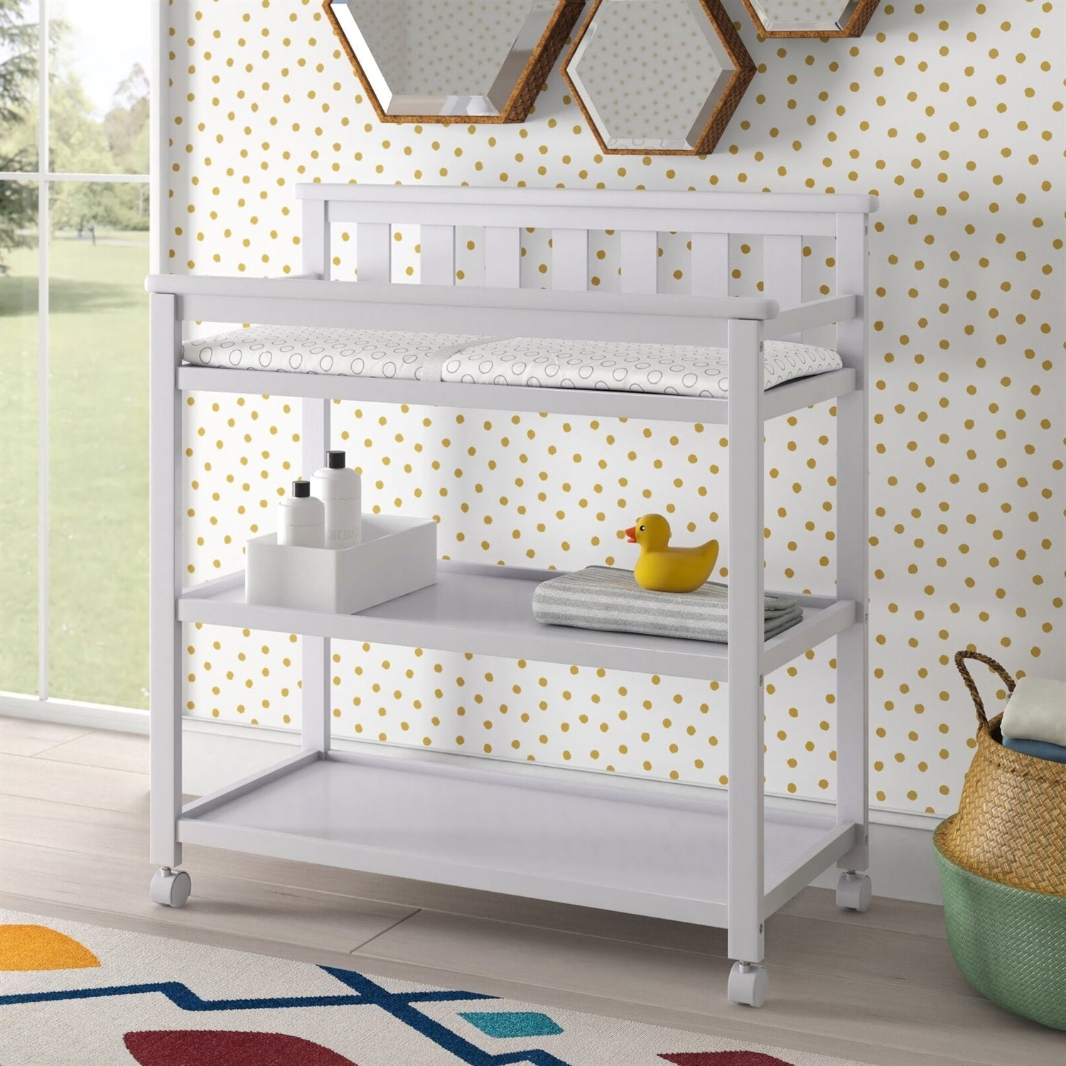 Stylish white Changing Tables with storage underneath and a soft pad on top, perfect for nursery organization.