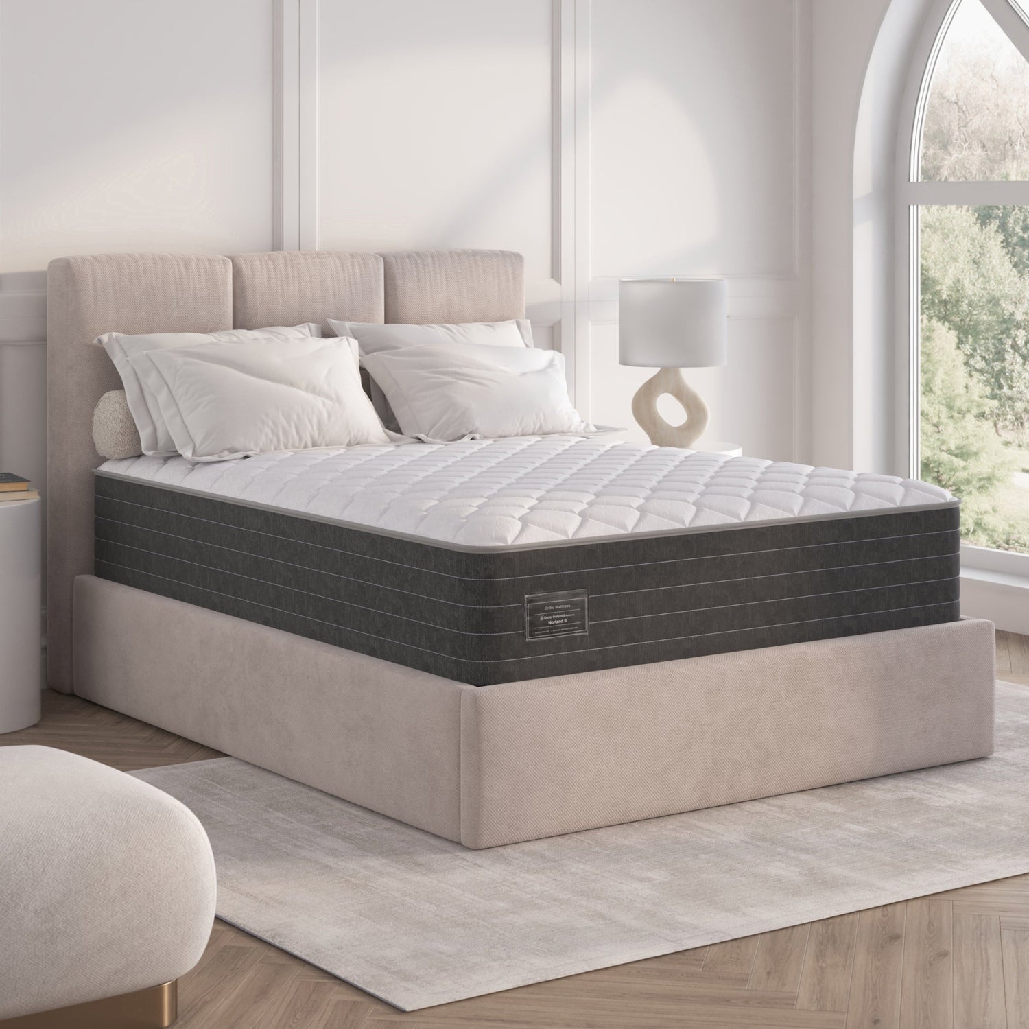 Full and Queen Mattresses displayed in an elegant bedroom setup with a plush headboard and cozy bedding.