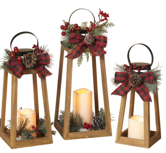 Christmas Lanterns with festive decorations, including bows, berries, and candles for holiday charm.