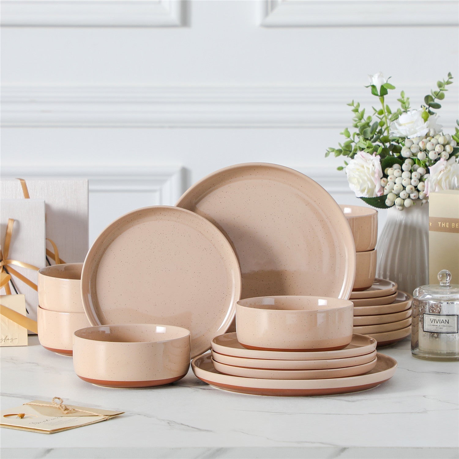 Elegant Dinnerware Sets featuring pastel-colored plates and bowls arranged on a stylish table.