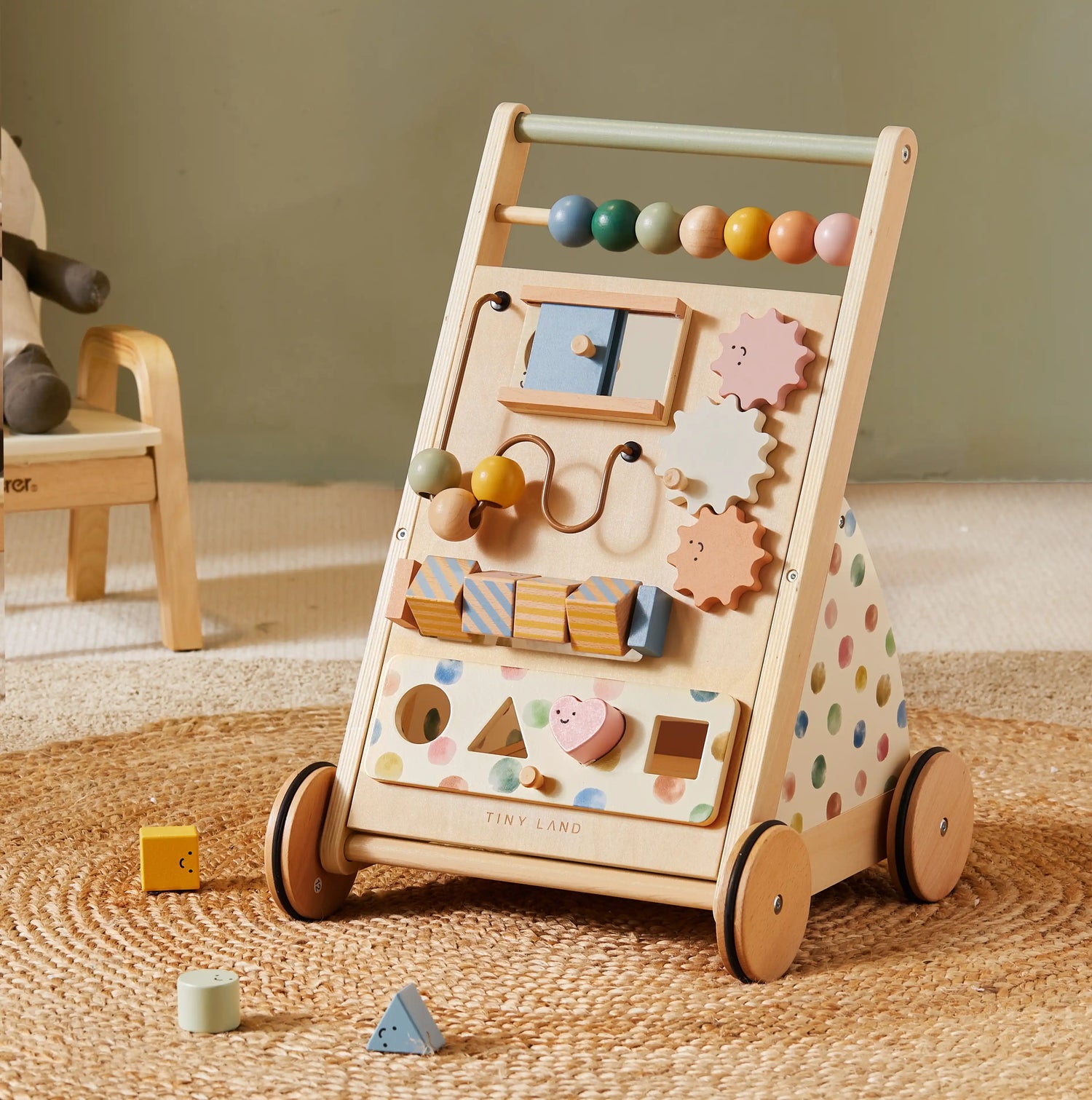 Colorful wooden baby toy activity cart with various shapes and colors for toddlers to explore and learn.