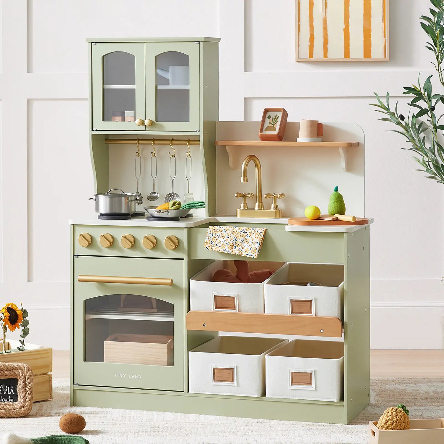 Play Kitchens display featuring a wooden kitchen set with accessories, perfect for imaginative play.