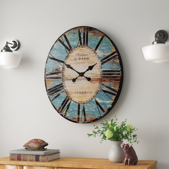 Wall clock design featuring a vintage style with blue accents, perfect for lovers of classic Clocks.