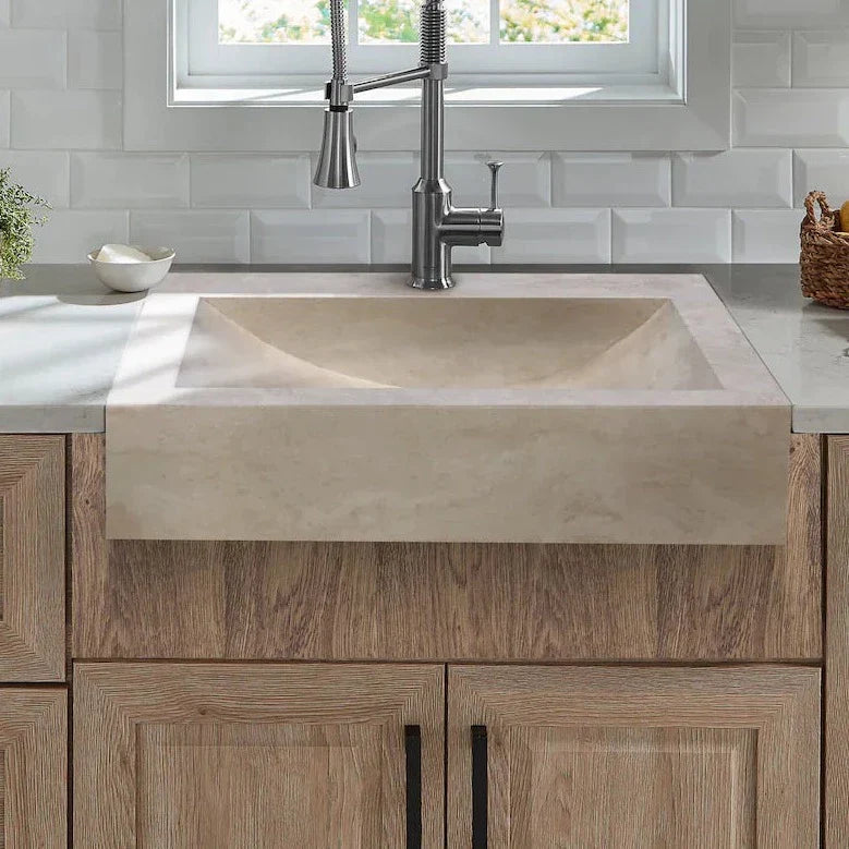 A stylish kitchen sink with a modern faucet in a contemporary kitchen setting featuring wooden cabinetry.