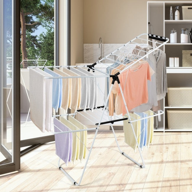 Clothes Drying Racks with colorful clothes hanging in a bright room, showcasing a practical laundry solution.
