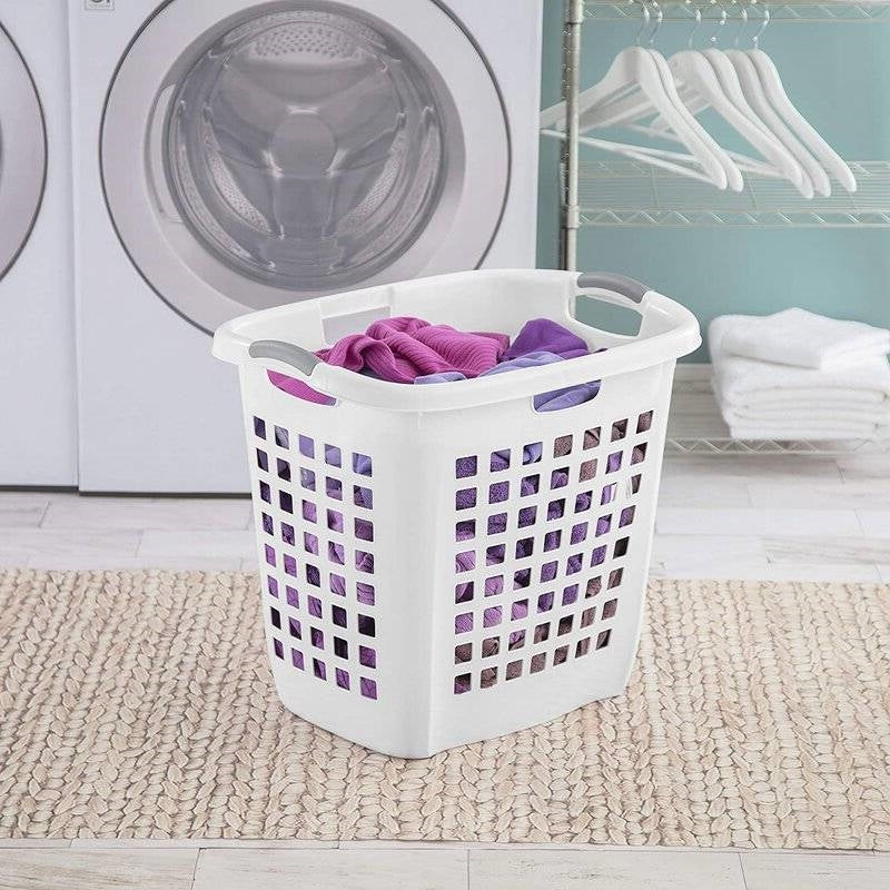 Laundry Baskets filled with colorful clothes, placed in a laundry room near a washing machine.